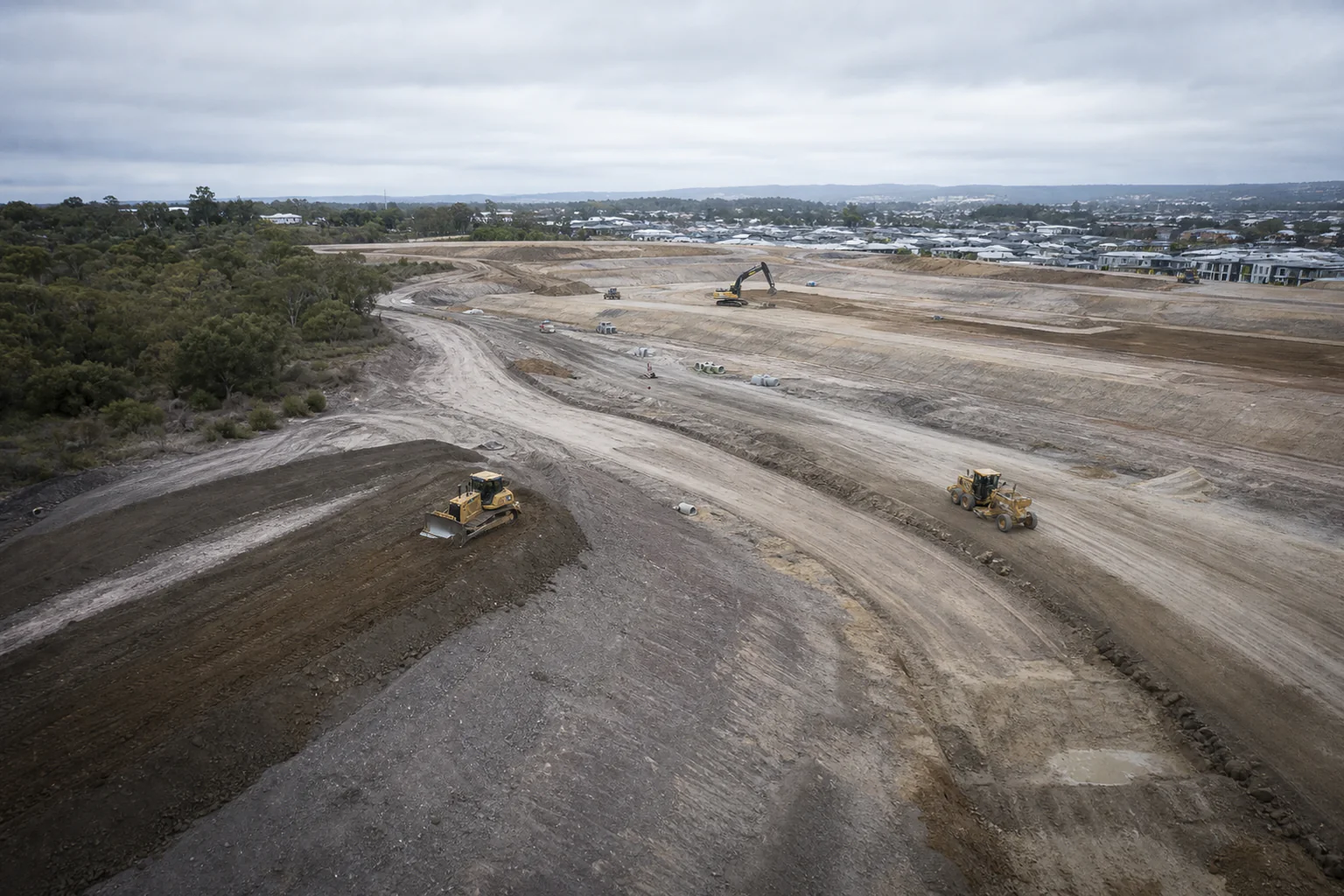 Earthmoving plant working a subdivision-scale Perth site