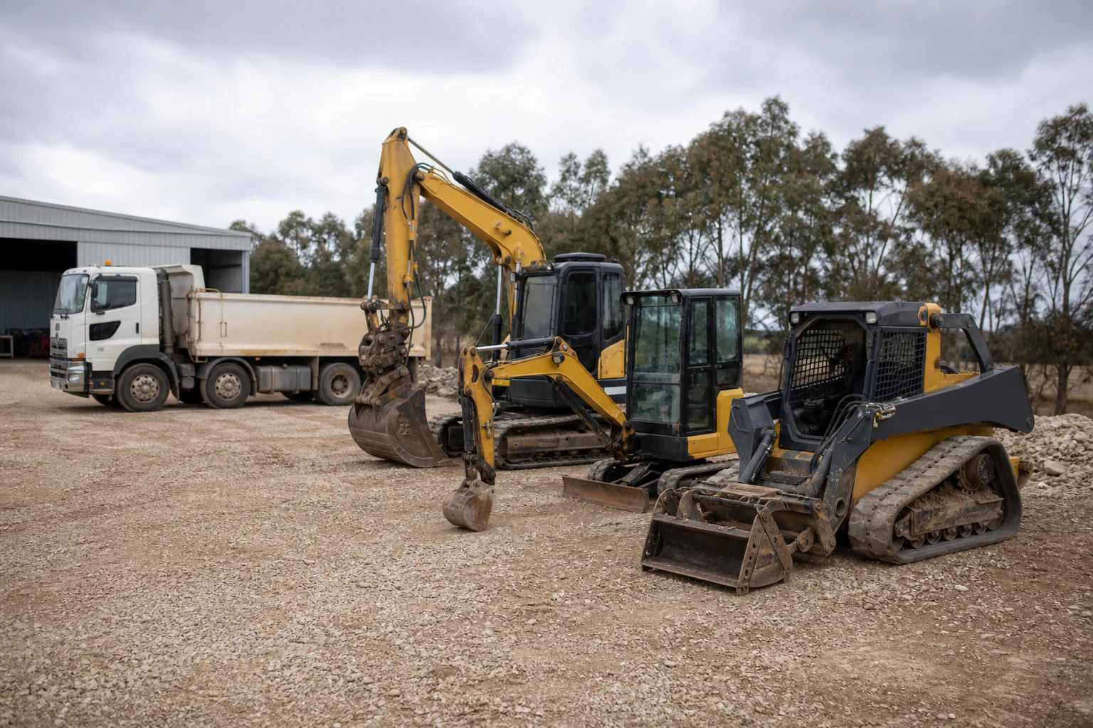 Earthmoving fleet at dawn on a Perth worksite